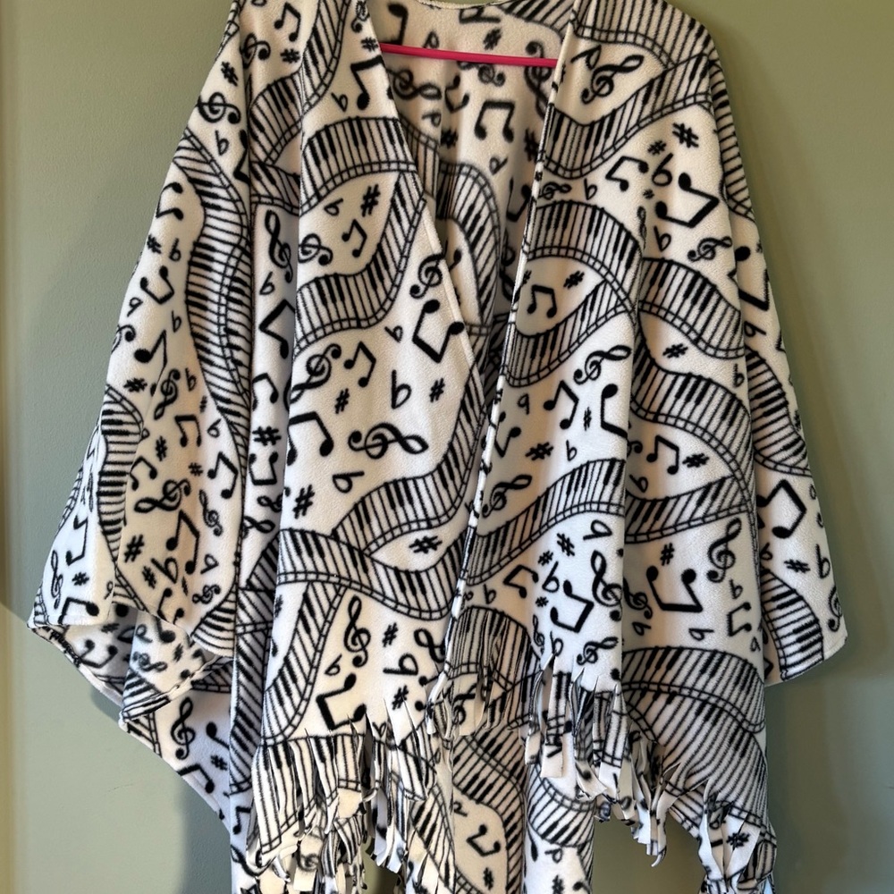 Cape Fleece musical note keyboard fringed black and white one size fits most.